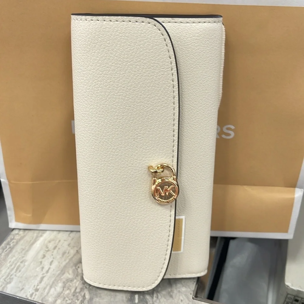 Michael Kors Hamilton Large Leather Continental Wallet
Light Cream
NWT
L - Picture 11 of 16